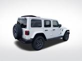 Thumbnail of 2025 Bright White Clearcoat Jeep Wrangler