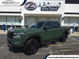 Photo of 2023 Tactical Green Metallic Nissan Frontier