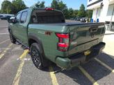 Thumbnail of 2023 Tactical Green Metallic Nissan Frontier