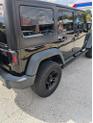 Thumbnail of 2012 Black Clearcoat Jeep Wrangler Unlimited