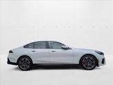 Thumbnail of 2026 Mineral White Metallic BMW 550e