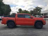 Thumbnail of 2025 Afterburn Orange Nissan Frontier