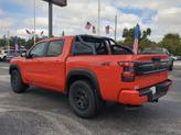 Thumbnail of 2025 Afterburn Orange Nissan Frontier