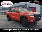 Photo of 2025 Afterburn Orange Nissan Frontier
