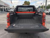 Thumbnail of 2025 Afterburn Orange Nissan Frontier