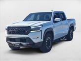 Photo of 2022 Glacier White Nissan Frontier