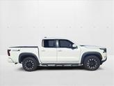 Thumbnail of 2022 Glacier White Nissan Frontier