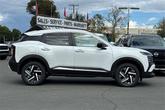 Thumbnail of 2026 Aspen White Tricoat Nissan Kicks