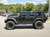 Thumbnail of 2025 Black Clearcoat Jeep Wrangler