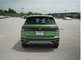 Thumbnail of 2025 Bright Moss Green Volkswagen Taos