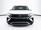 Thumbnail of 2024 Pure White Volkswagen Taos