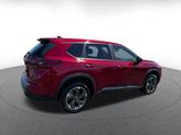 Thumbnail of 2024 Scarlet Ember Tintcoat Nissan Rogue