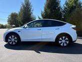 Thumbnail of 2023 Pearl White Multi-Coat Tesla Model Y
