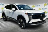 Photo of 2025 Aspen White Tricoat Nissan Kicks