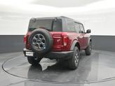 Thumbnail of 2025 Ruby Red Metallic Tinted Clearcoat Ford Bronco