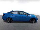 Thumbnail of 2024 Electric Blue Metallic Nissan Versa