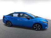 Thumbnail of 2024 Electric Blue Metallic Nissan Versa