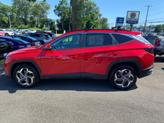 Thumbnail of 2023 Calypso Red Hyundai TUCSON
