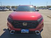 Thumbnail of 2024 Radiant Red Metallic Honda CR-V Hybrid