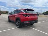 Thumbnail of 2023 Calypso Red Hyundai TUCSON