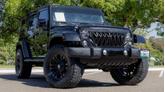 Thumbnail of 2014 Black Clearcoat Jeep Wrangler Unlimited