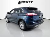 Thumbnail of 2022 Stone Blue Metallic Ford Edge