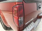 Thumbnail of 2015 Lava Red Nissan Frontier