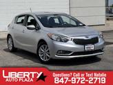 Photo of 2014 Bright Silver Kia Forte