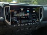 Thumbnail of 2026 Glacier White Nissan Frontier