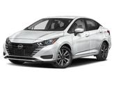 Photo of 2025 Aspen White Tricoat Nissan Versa