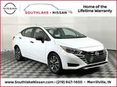 Photo of 2025 Aspen White Tricoat Nissan Versa