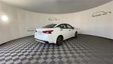Thumbnail of 2025 Aspen White Tricoat Nissan Versa