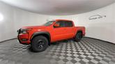 Thumbnail of 2025 Afterburn Orange Nissan Frontier