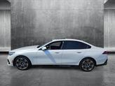 Thumbnail of 2025 Mineral White Metallic BMW 530