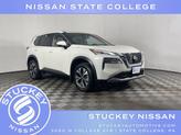 Photo of 2023 Pearl White Tricoat Nissan Rogue