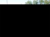 Thumbnail of 2024 Blue Crush Metallic/Jet Black Toyota Corolla Hybrid