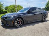 Thumbnail of 2024 Black Sapphire Metallic BMW i4 Gran Coupe