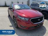 Photo of 2016 Ruby Red Metallic Tinted Clearcoat Ford Taurus