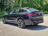 Thumbnail of 2024 Black Sapphire Metallic BMW X4 M