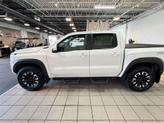 Thumbnail of 2023 Glacier White Nissan Frontier