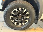 Thumbnail of 2023 Glacier White Nissan Frontier
