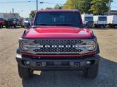 Thumbnail of 2025 Ruby Red Metallic Tinted Clearcoat Ford Bronco