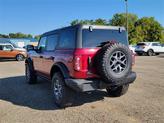Thumbnail of 2025 Ruby Red Metallic Tinted Clearcoat Ford Bronco