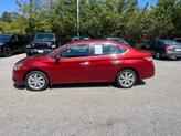 Thumbnail of 2015 Cayenne Red Nissan Sentra