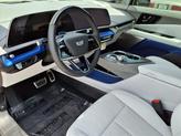 Thumbnail of 2025 Radiant Red Tintcoat Cadillac OPTIQ