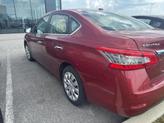 Thumbnail of 2015 Cayenne Red Nissan Sentra