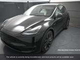 Thumbnail of 2022 Solid Black Tesla Model Y