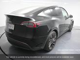 Thumbnail of 2022 Solid Black Tesla Model Y