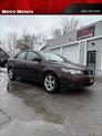 Photo of 2010 Burgundy Kia Forte