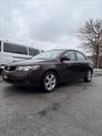 Thumbnail of 2010 Burgundy Kia Forte